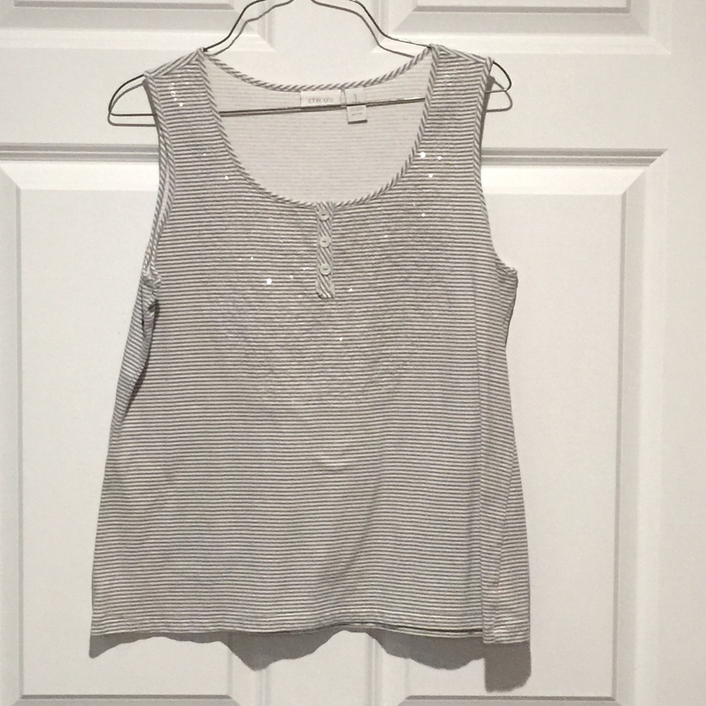 Chico’s Top. Has Some sparkle on the front. Size 1